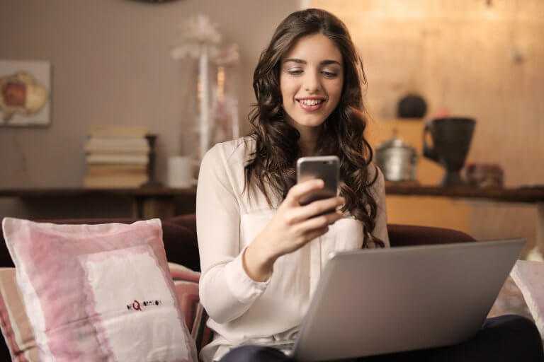 Woman looking at app on the phone