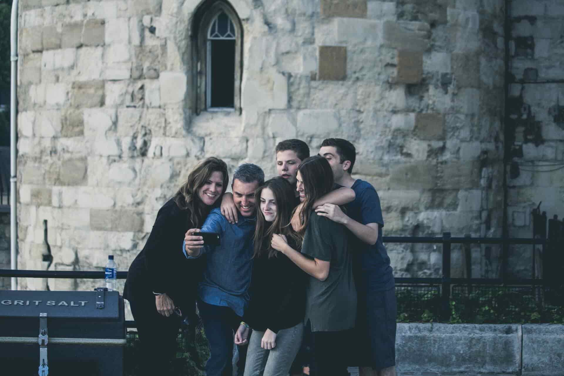 Memorial Day Getaways from Chicago | Move Matcher | Chicago Taking a family selfie on the street
