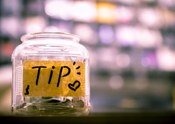 Tip jar with cash