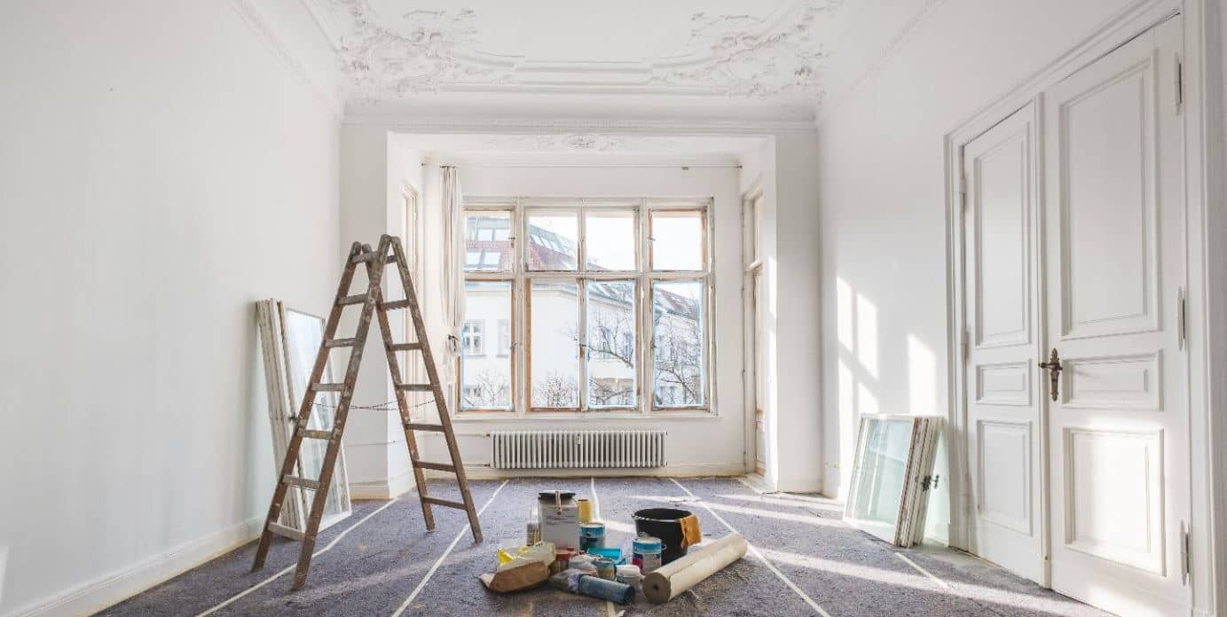 Apartment being painted in white