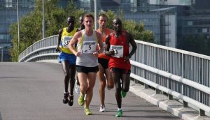 Five guys running during a marathon